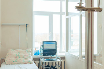 isolated hospital room with a bed and medical equipment in the hospital. Patient room in quarantine isolation. epidemic Coronavirus, MERS-CoV,  2019-nCoV,   Covid-19 self-isolation, pandemic