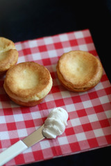 Homemade yorkshire pudding and cream cheese. Selective fcous.