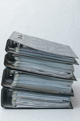 stack of files and folders on table, business concept