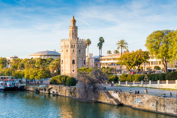 The Torre del Oro tower in Seville, Spain. - obrazy, fototapety, plakaty
