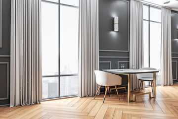 Contemporary cafe interior with dishware and city view