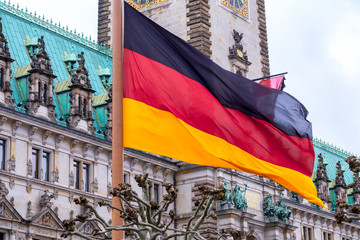 The flag of Germany on the flagpole near the city hall of Hamburg was lowered in mourning.