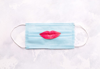 funny collage with mask and lips on a white background. virus protection concept