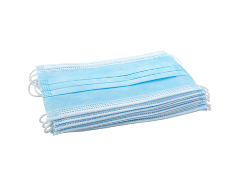 Close Up Stack Light Blue Surgical Mask (medical Face Mask) With White Rope Strap For Protective Coronavirus (COVID-19) Pandemic Or PM2.5 Dust Particles Isolated On White Background