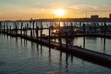Fototapeta premium recreational port in river at sunset with old boats