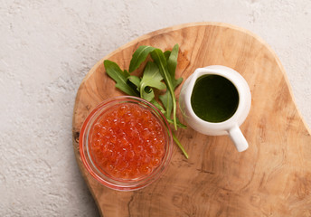 red caviar in glass dish