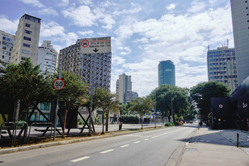 Cidade Jardim Avenue during coronavirus outbreak, Sao Paulo, Brazil with some cyclists. March 2020