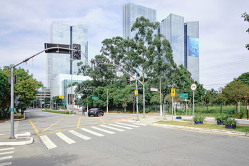 Vila Olimpia empty during coronavirus outbreak, Sao Paulo, Brazil with some cyclists - March 2020