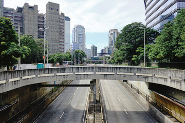Empty tunel in Vila Olimpia, during coronavirus outbreak, Sao Paulo, Brazil with some cyclists -...