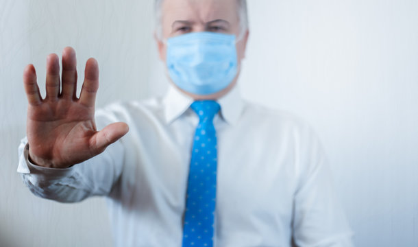 Coronavirus quarantine and Air pollution pm2.5 concept. Old sick man wearing respirator mask for protect. Wuhan, China epidemic virus symptoms background.