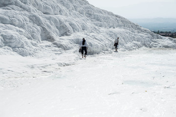 .pamukkale thermal springs from white limestone tourists walk cotton castle cultural object UNESCO World Heritage Turkey