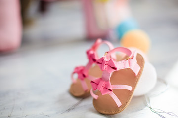 Baby pink sandals in the interior