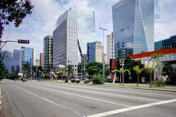 Empty Juscelino Kubitschek Avenue with some cars, during coronavirus outbreak, Sao Paulo, Brazil...