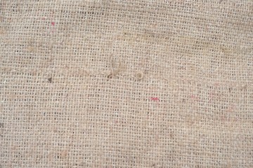 Natural burlap fabric close-up, background