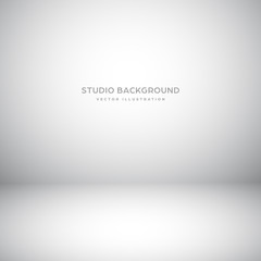 Empty gray studio abstract background with spotlight effect. Product showcase backdrop.