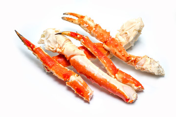 Alaskan King Crab isolated on white background, Cooked Organic Alaskan King Crab Legs on white,