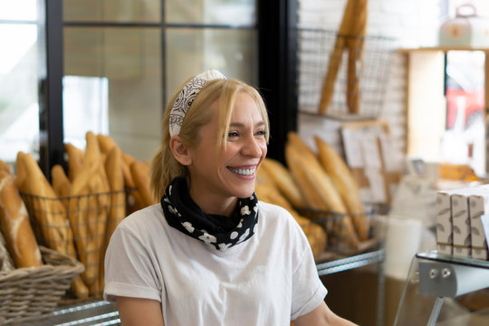 beautiful working woman in her bakery