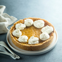 Homemade pumpkin pie with whipped cream