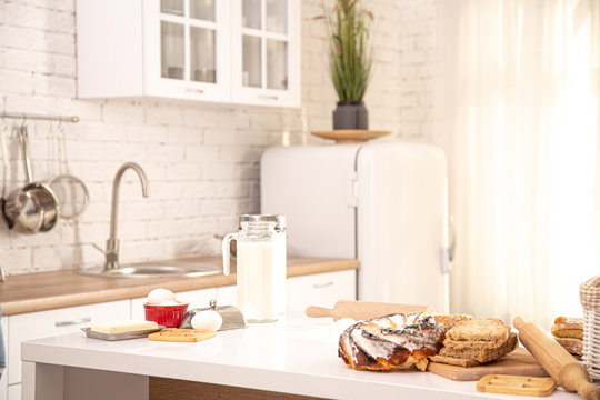 Home Kitchen Interior With Fresh Pastries On The Table.