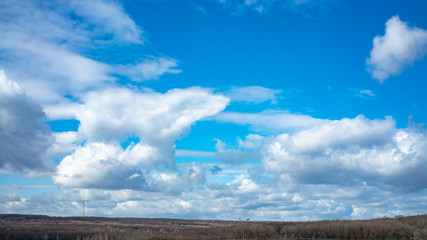 horizon with blue sky and white clouds , weather, landscape