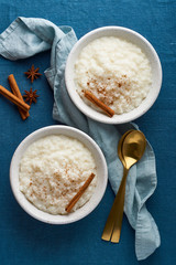 Rice pudding. French milk rice dessert. Healthy Vegan diet breakfast. Top view, vertical