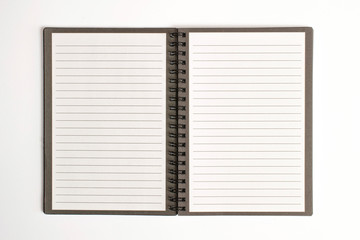 Opened spiral diary with blank pages with rows on white background as template on education or business tematics