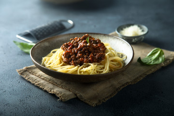 Homemade traditional pasta Bolognese with minced meat and tomato sauce