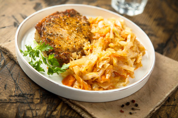 Pork cutlet with sauerkraut stew