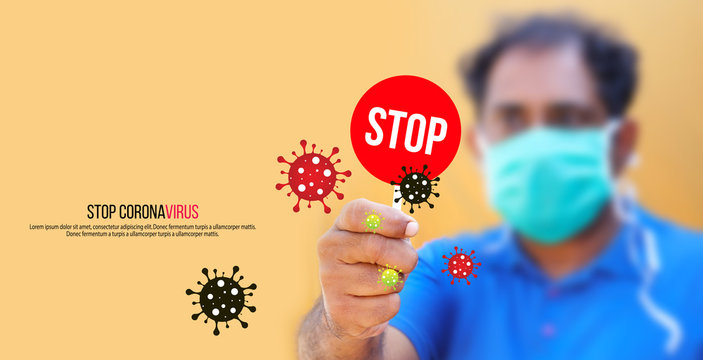 Stop the infection! Healthy man showing gesture "stop". Photo of man wear protective mask against infectious diseases and flu. Health care concept.