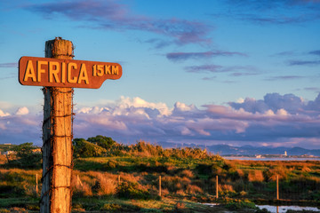 Evening light on the signpost to Africa, Tarifa Spain