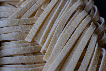 green and yellow healthy egg noodles close-up