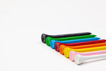 Golf set - golf ball and wooden tees.