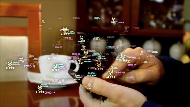 Covid-19 virus global pandemic alert around smartphone in hands. Keywords flying over mobile phone and fingers. Searching for medical information.