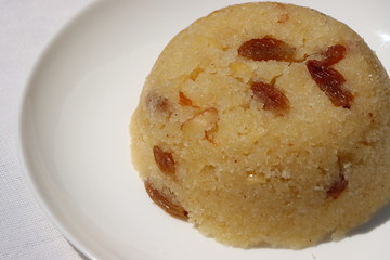 Shira or Sheera or Suji  Halwa is an Indian sweet dish made of Semolina and ghee along with nuts, raisins and dried fruits
