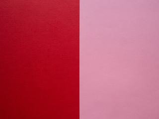 Red and pink two-tone halved paper abstract background template with copy space.