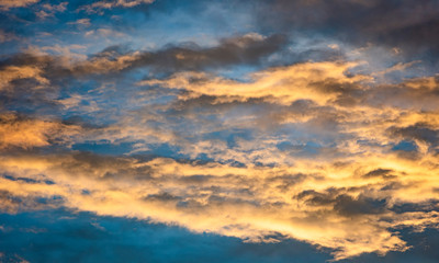 Obraz premium dramatic sunset sky.orange clouds