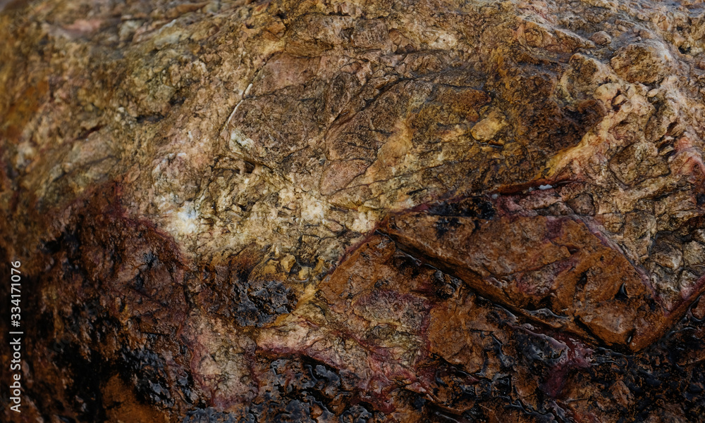 Wall mural the close-up relief of the rocks.rock background