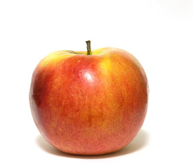 Red juicy apple on a white background