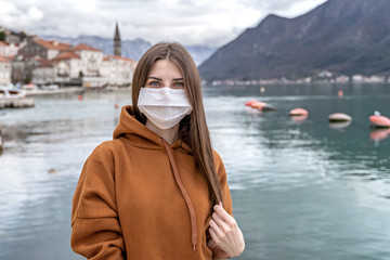Girl with mask to protect her from Corona virus. Corona virus pandemic