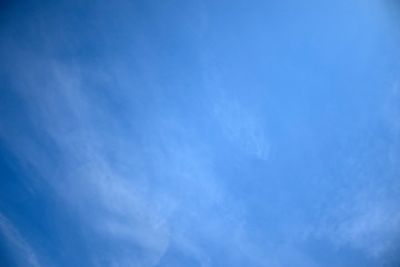 Blue sky with white clouds on the background