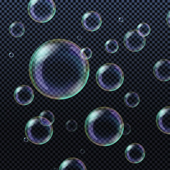 Realistic soap bubbles isolated on transparent background. Vector illustration.	