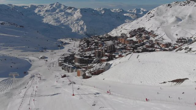 Aerial shot of people skiing in a french ski resort in the Alps VAL THORENS, FRANCE