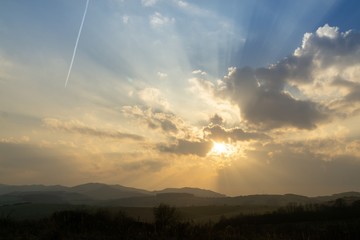 Sunrise or sunset over the hills and meadow. Slovakia