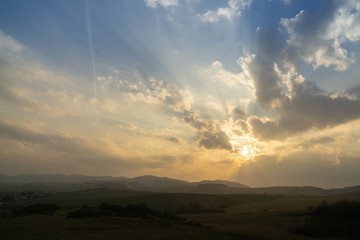 Sunrise or sunset over the hills and meadow. Slovakia