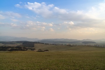 Fototapeta premium Sunrise or sunset over the hills and meadow. Slovakia