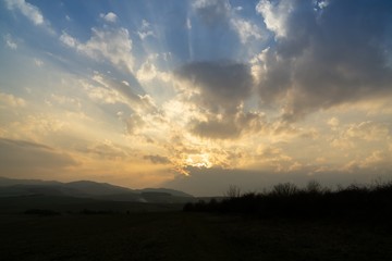 Sunrise or sunset over the hills and meadow. Slovakia
