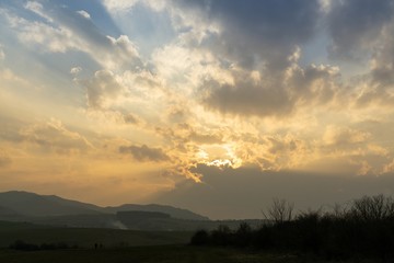 Sunrise or sunset over the hills and meadow. Slovakia