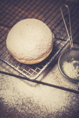 Traditional Polish donuts on wooden background. Tasty doughnuts with jam