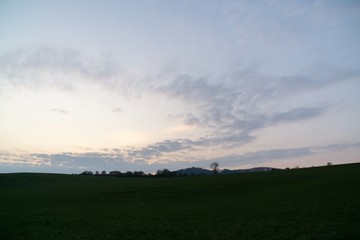 Sunrise or sunset over the hills and meadow. Slovakia