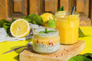 Chia pudding with homemade granola, lemon curd for breakfast